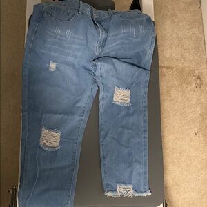 Women's Distressed Light Blue Jeans